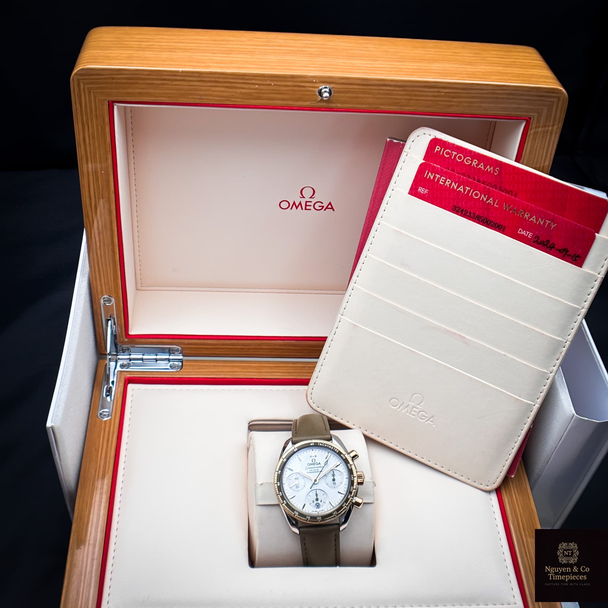Omega  Speedmaster 38 Co Axial Chronograph